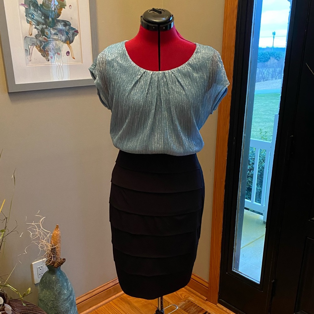 Metallic blue top with black bottom dress.